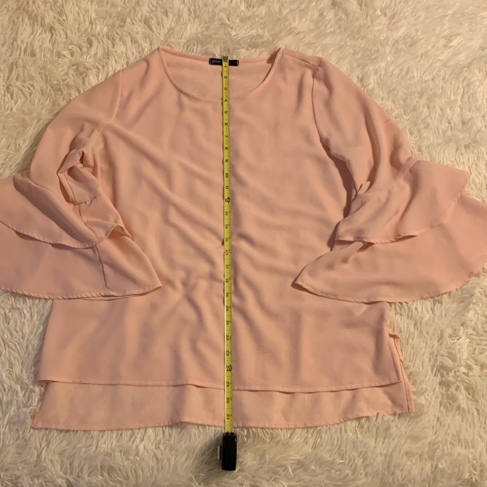 Women’s long sleeve light pink blouse